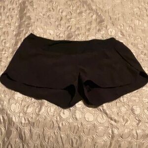 Black shorts, large with pocket on the back